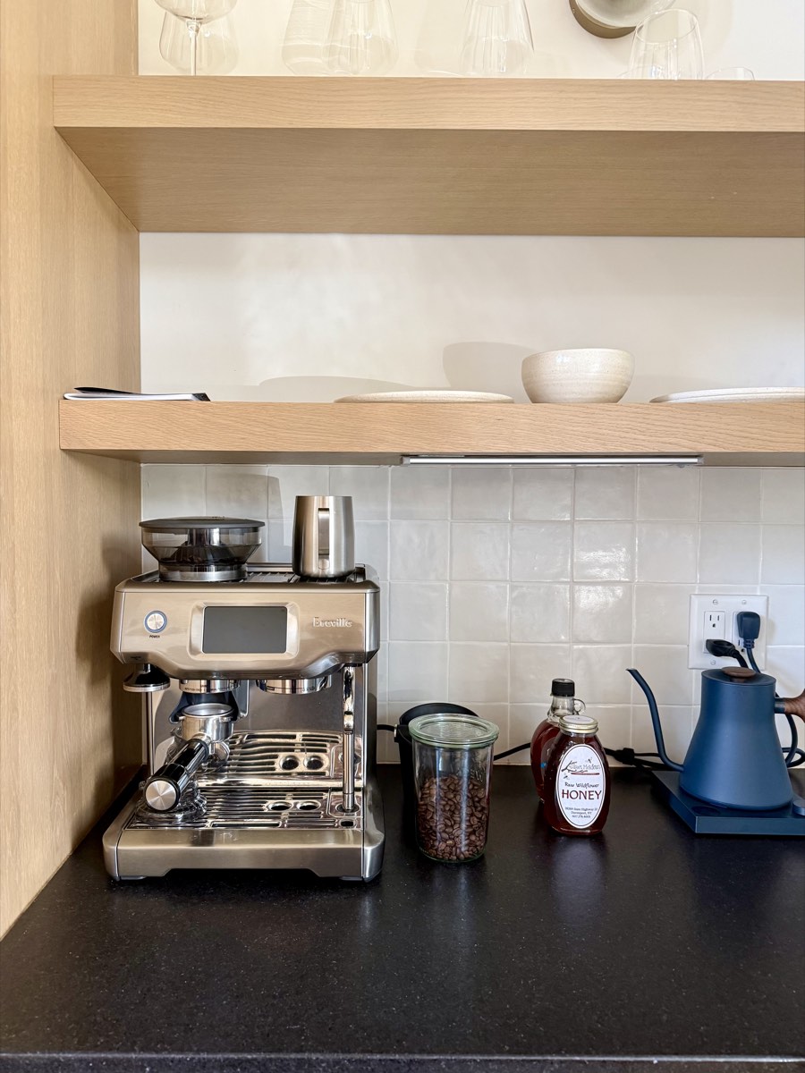Espresso bar — Breville machine under light oak shelving