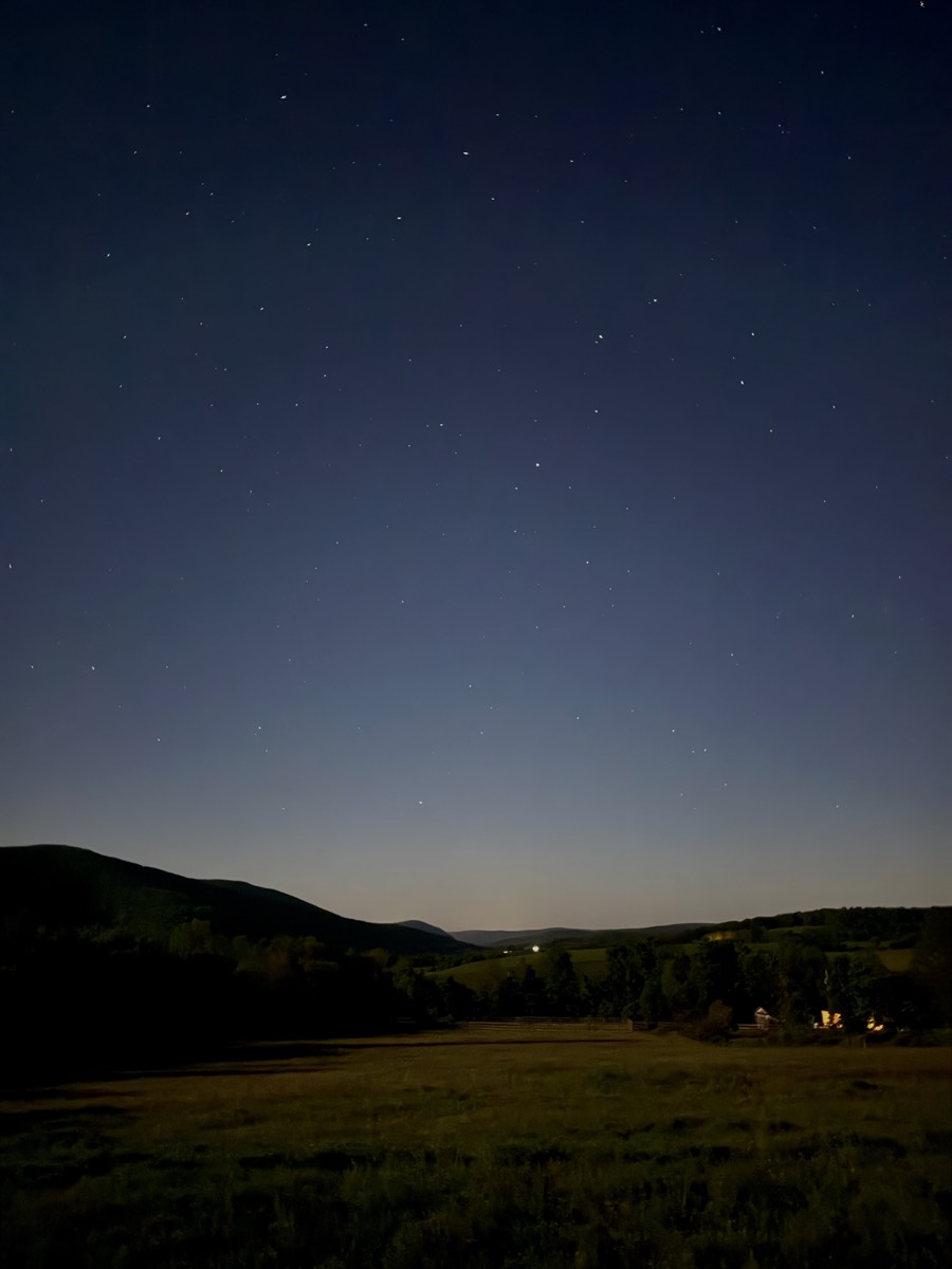 The land at night, under the stars